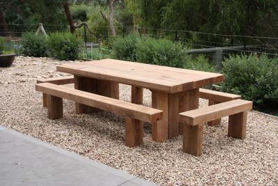 Iron King table setting in spotted gum, handcrafted by TK Outdoor Furniture